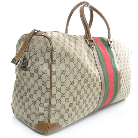 gucci grey duffle bag|Gucci monogram large duffle.